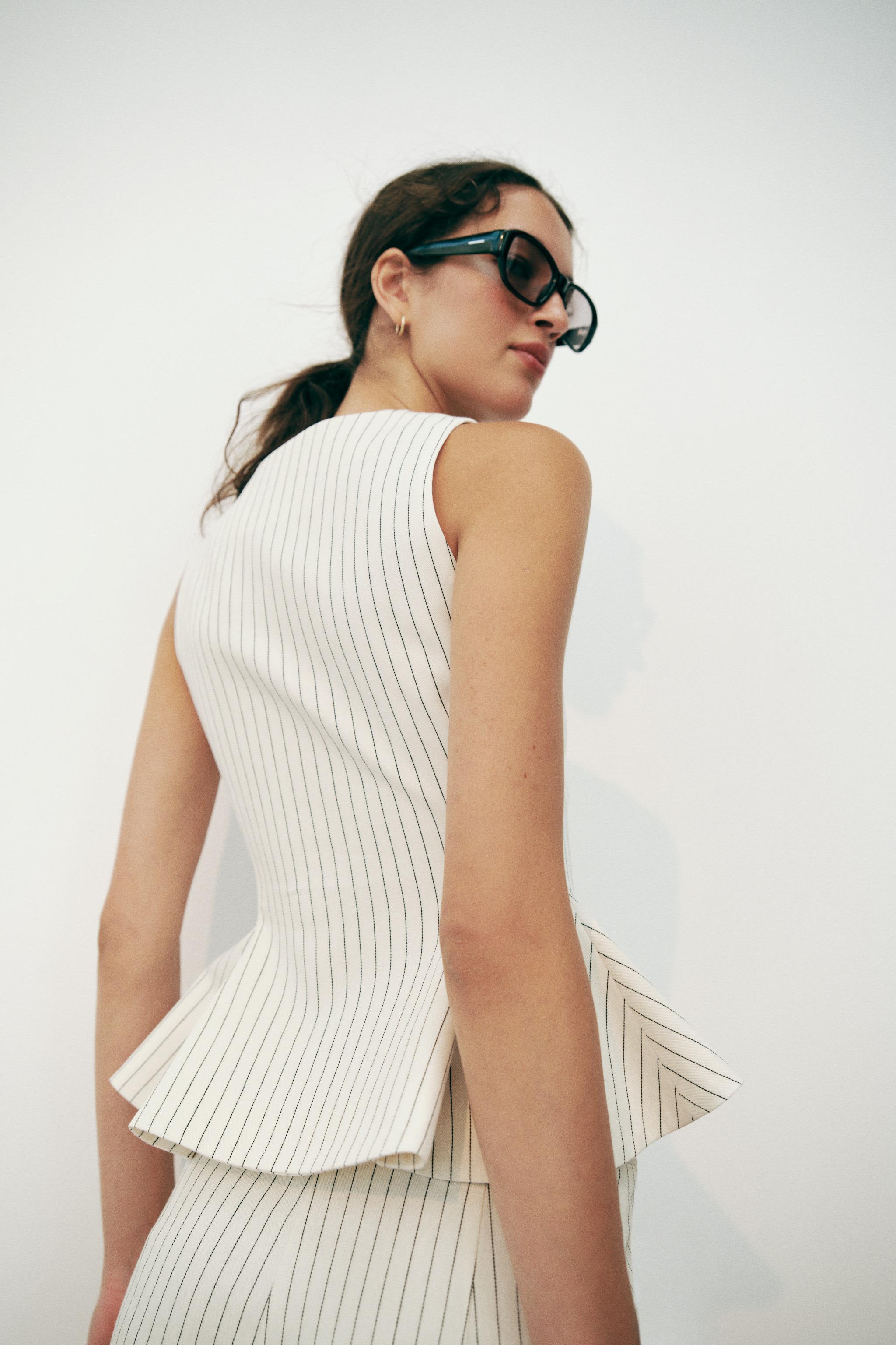 STRIPED PEPLUM VEST